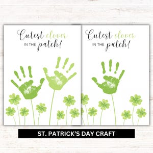 May include: Two white St. Patrick's Day craft prints with green handprints and four-leaf clovers. The text "Cutest clover in the patch!" is written in a script font. The bottom of the prints read "ST. PATRICK'S DAY CRAFT".