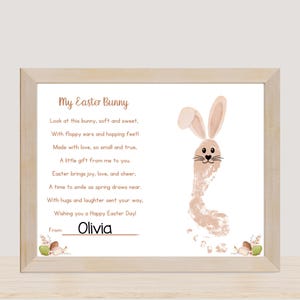 May include: A printable Easter card with a poem about a bunny made with a footprint. The poem reads "My Easter Bunny, Look at this bunny, soft and sweet, With floppy ears and hopping feet! Made with love, so small and true, A little gift from me to you. Easter brings joy, love, and cheer, A time to smile as spring draws near. With hugs and laughter sent your way, Wishing you a Happy Easter Day!" The card is signed "Olivia".