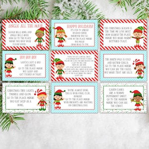 May include: Nine colorful cards with elf illustrations and Christmas-themed scavenger hunt clues. Each card has a different clue, such as "Jingle all the way!" and "Ho! Ho! Ho!"