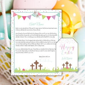 May include: A printable Easter card with a message about the resurrection of Jesus Christ. The card features a colorful banner, a cross, and a bunny rabbit. The text on the card reads "Happy Easter with Love."