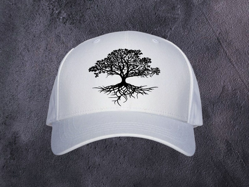May include: A white baseball cap with a black tree design. The tree illustration shows a detailed crown and roots, creating a nature-inspired graphic. The cap has a curved peak and a classic, adjustable fit.