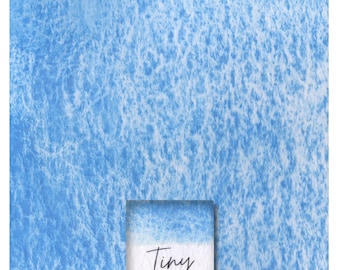 May include: A close-up of a blue watercolor wash with a white splatter pattern. The color is labeled "Tiny Zirconium Blue".