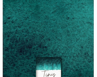 May include: A teal blue watercolor paint sample with the text "Tiny Phthalo Turquoise Deep" on a white label.