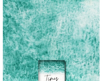 May include: A teal watercolor wash with a white gradient. The text "Tiny's Cobalt Green" is printed on a white label.