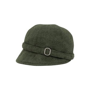 May include: A dark green cloche hat with a small brim and a band around the crown. The band features a silver-colored buckle. The hat is made of a textured fabric and is set against a white background.