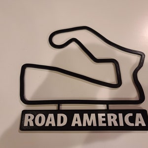 Muurkunst routekaart Road America met naambord