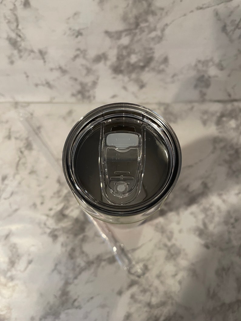 Top view of tumbler showing splash proof lid open.