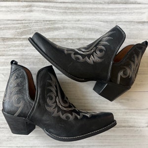 Black leather stitched cowboy boots