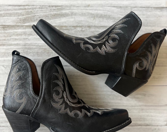 Black leather stitched cowboy boots