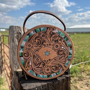 Tooled round bag