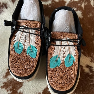 Feather tooled shoes