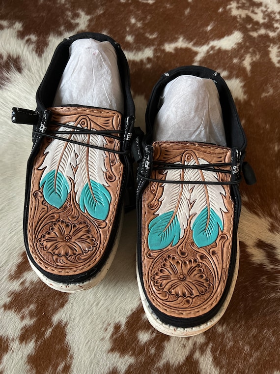Feather tooled shoes