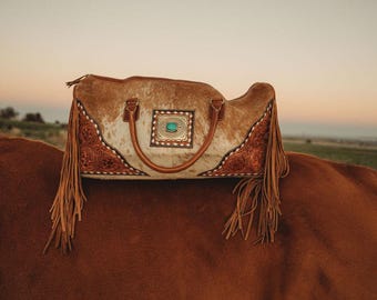 Concho cowhide duffel bag