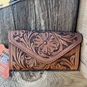 Brown tooled leather wallet