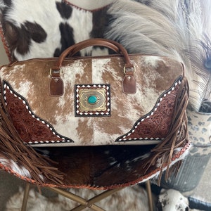 Concho cowhide duffel bag