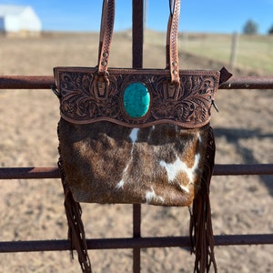Stunning cowhide fringe purse