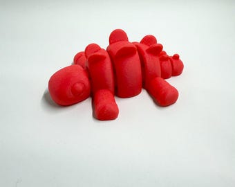 Dinosaure articulé imprimé en 3D pour le TDAH sensoriel