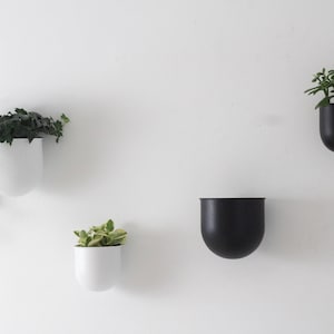 Pot de fleurs mural minimaliste rond en métal