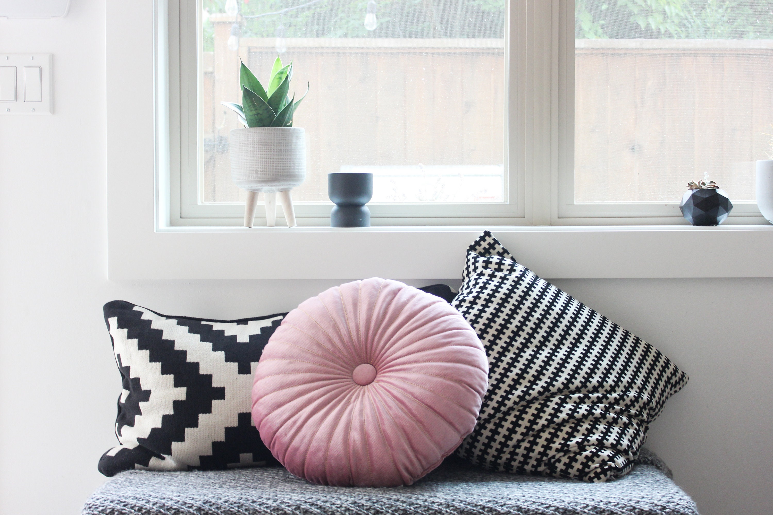 Pink round top throw pillows