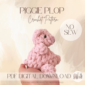 May include: A pink crocheted pig toy with black eyes and a pink nose. The toy is sitting on a hand and the text "PIGGIE PLOP Crochet Pattern NO SEW PDF DIGITAL DOWNLOAD" is visible below the toy.