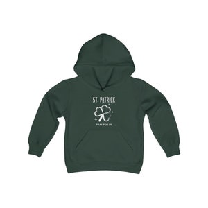 May include: A dark green hooded sweatshirt with a white shamrock and the text "St. Patrick Pray for Us".