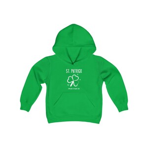 May include: A green hooded sweatshirt with a white shamrock and the text "St. Patrick Pray for Us".