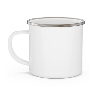 May include: White enamel mug with a silver rim. The mug has a rounded handle.