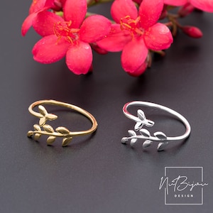 Justerbar ring i sterlingsilver med bladmotiv, minimalistisk stil