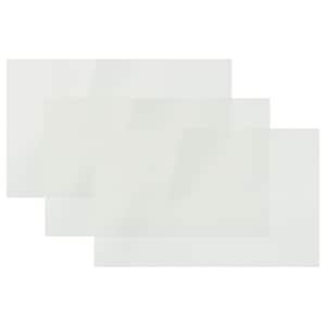 May include: Three white, translucent sheets of paper, stacked on top of each other.