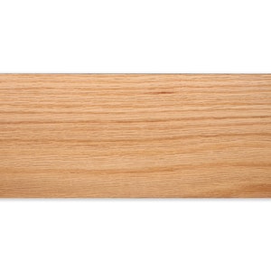 May include: A close-up of a light brown wood grain surface. The wood has a natural, unfinished look.