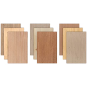 May include: Eight wood veneer samples in various shades of brown, beige, and gray. The samples are arranged in two rows of four.