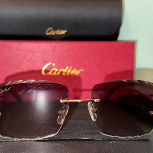 Cartier glasses hotsell dark tint