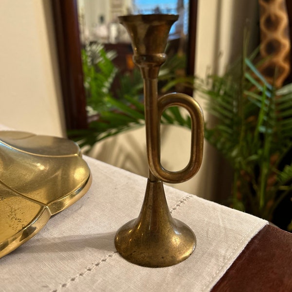 Brass trumpet candlestick holder