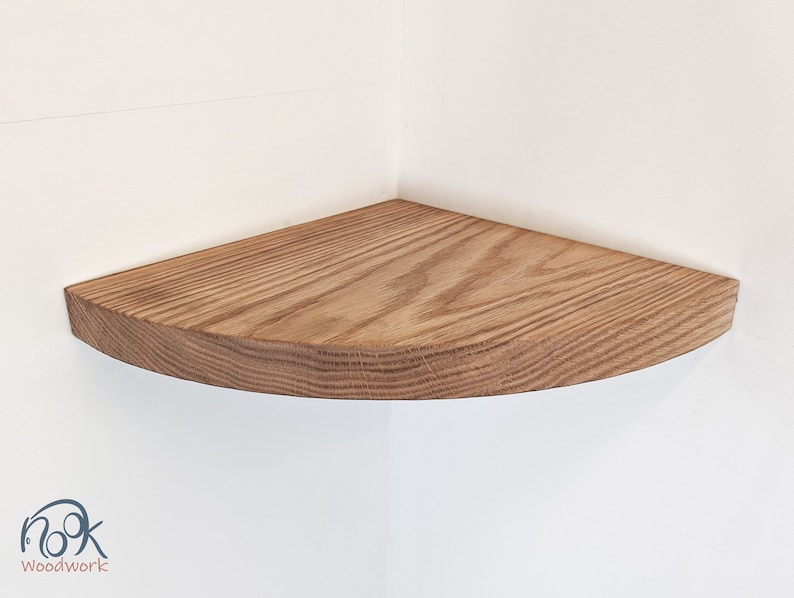 Front view an oak floating shelf for a wall corner.