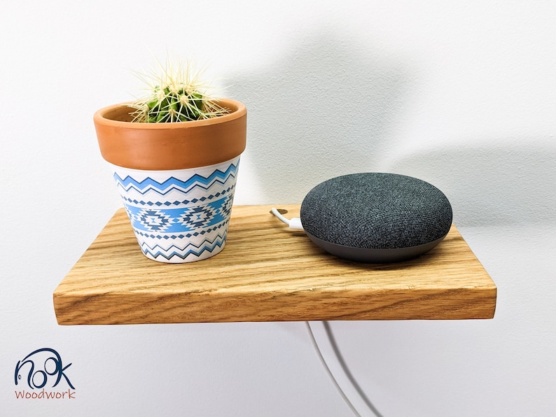 Oak Floating Shelf with Hole for Cable Management. This shelf has clean edges and is easily installed 