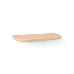 A light-colored wooden wall shelf featuring a smooth, flat top surface and a semi-circular, rounded front edge. The shelf has a natural wood grain texture and a clean, simple design with no visible mounting hardware or brackets.