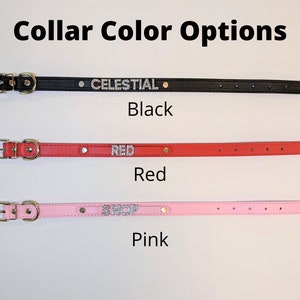 May include: Three leather dog collars in black, red, and pink with rhinestone lettering. The black collar says "CELESTIAL", the red collar says "RED", and the pink collar says "SHOP".