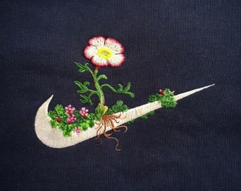nike symbol with flowers