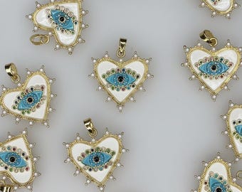 Colgante con dije de corazón y ojo turco de perla en oro blanco