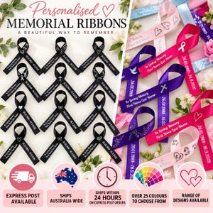 May include: A collection of personalised memorial ribbons in various colours including black, pink, and purple. Each ribbon features printed text such as In Loving Memory, First Name Last Name, and dates, along with icons like hearts, crosses, and doves.