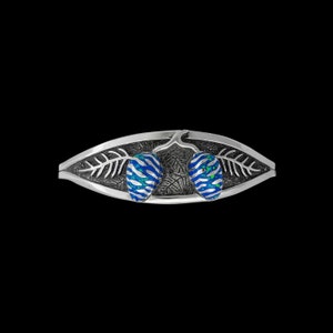 May include: A silver ring with a blue and green opal pine cone design.