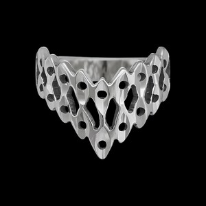 May include: A silver ring with a geometric design. The ring is made of a series of interlocking shapes that create a delicate and intricate pattern.