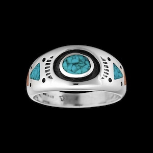 May include: A silver ring with a turquoise stone set in a circular design. The ring is decorated with smaller turquoise stones and copper accents.