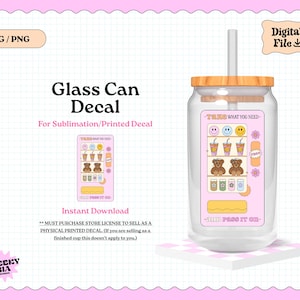 May include: A glass can decal with a wooden lid and a straw. The decal features a pink background with various graphics, including smiley faces, teddy bears, and drinks. Text on the decal reads "TAKE WHAT YOU NEED - AND PASS IT ON."