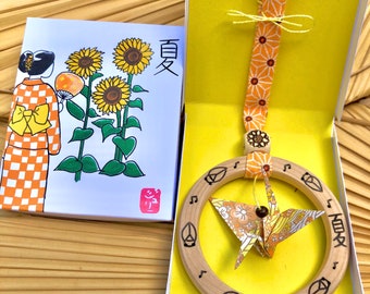Lucky charm origami Japanese crane Natsu, decorative ring summer and cicadas