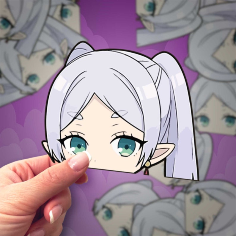 May include: A sticker featuring a cartoon character with long, white hair, blue eyes, and a pink earring. The character is wearing a white shirt and has a pink bow in their hair.