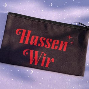 Schwarzes Mäppchen mit Hassen Wir Schriftzug im Retro Stil - Stoff Tasche mit Druck & schwarzem Reißverschluss perfekt für Stifte, Kosmetik