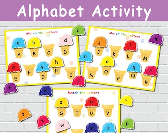 May include: Alphabet activity game with colorful ice cream cone graphics. The game features three matching boards with letters and ice cream cones. The text "Match the Letters" is displayed on each board. Includes magnetic letter pieces.