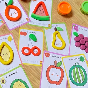 Puede incluir: Un conjunto de diez tarjetas coloridas con im&aacute;genes de diferentes frutas y verduras. Cada tarjeta tiene un t&iacute;tulo y el texto "Puedo hacer un" en la parte superior. Las tarjetas est&aacute;n dise&ntilde;adas para que los ni&ntilde;os aprendan sobre diferentes frutas y verduras.