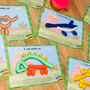 Dinosaures jouent aux tapis de pâte, au jeu imprimable, aux activités préscolaires, aux moments calmes des tout-petits, aux sacs occupés, à la maternelle, à la motricité fine.